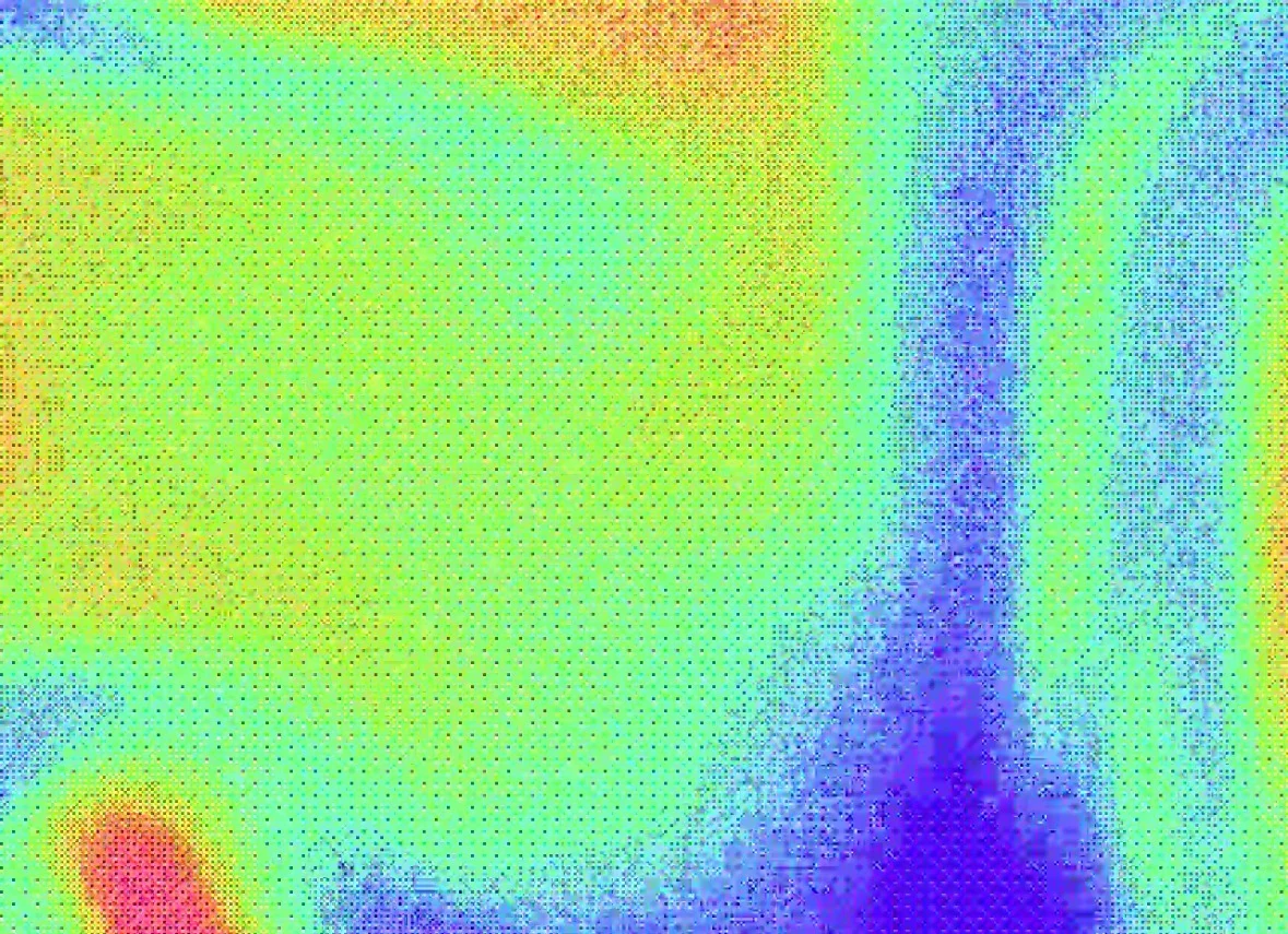 A colourful halftone pattern in lime green, yellow, blue and purple.